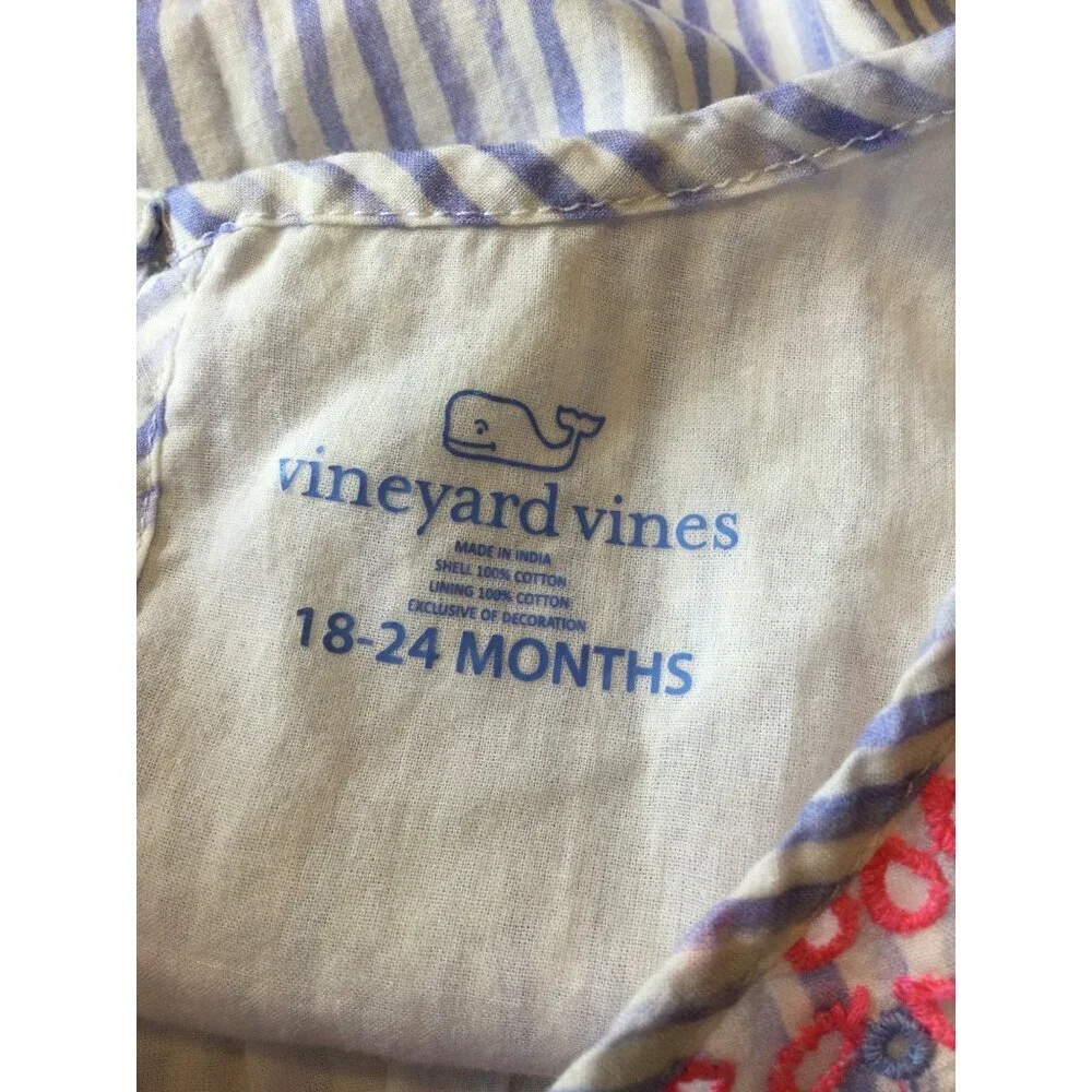 Vineyard Vines features 	•
